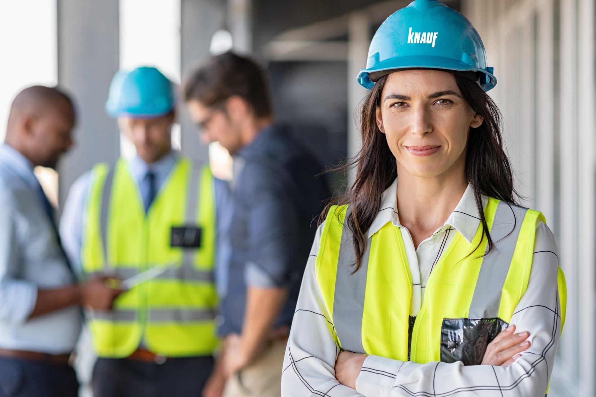 Confident architect at construction site