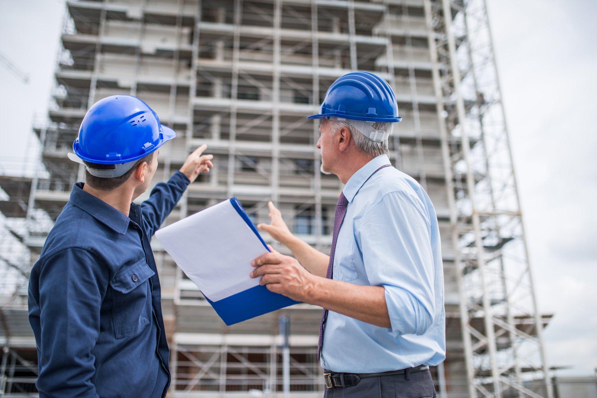 Architect explaining what work to do to the site manager